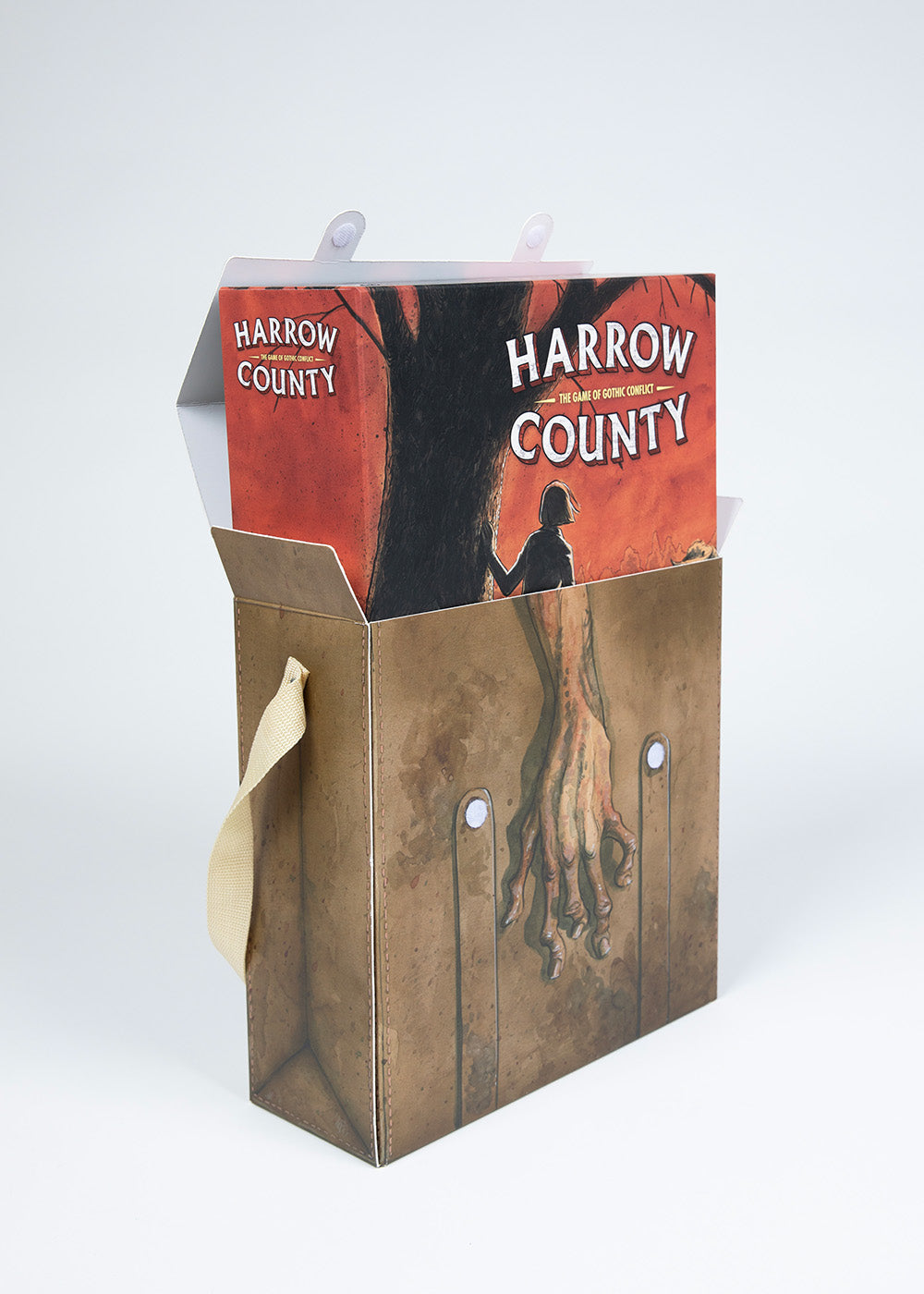 Harrow County board game half in satchel